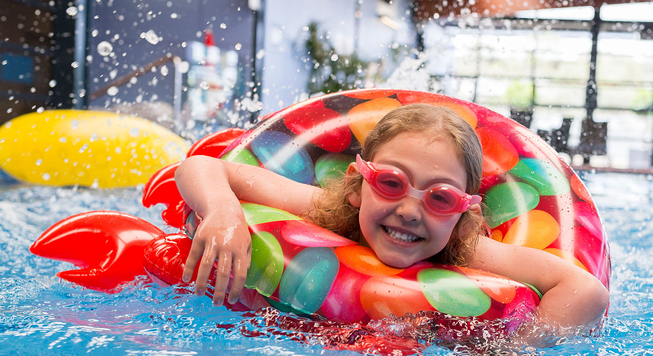 Child playing in our in-door heated pool